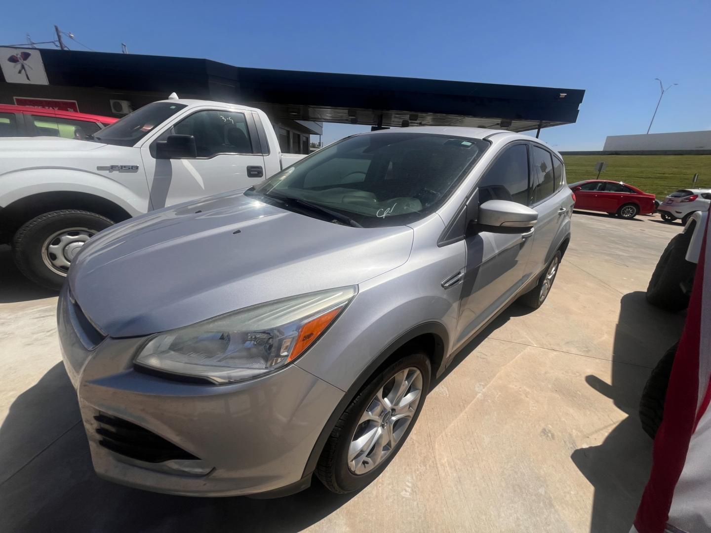 2013 BLACK FORD ESCAPE SEL SEL 4WD (1FMCU9H98DU) with an 2.0L L4 DOHC 16V engine, 6-Speed Automatic transmission, located at 8101 E. Skelly Dr., Tulsa, OK, 74129, (918) 592-3593, 36.121891, -95.888802 - Photo#0